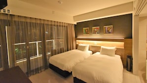 A hotel room with two beds, a large window with curtains, and artwork on the wall. - HOTEL Viviana (Naha)
