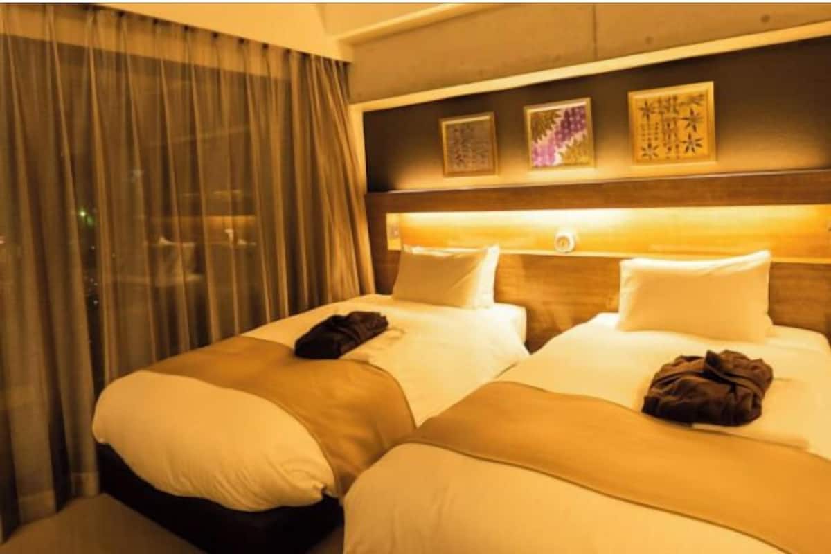 Premium bedding, down duvets, pillow-top beds, in-room safe