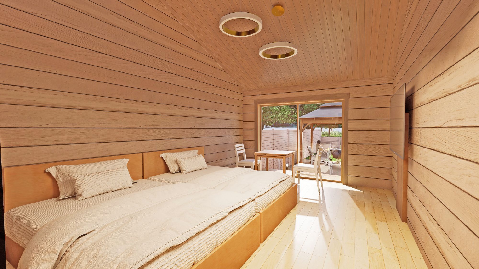 A wooden room with a bed, a table, and chairs.