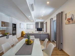 Apartment (#5) | Living area | Flat-screen TV