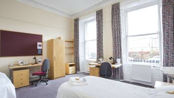 Desk, laptop workspace, free WiFi, bed sheets