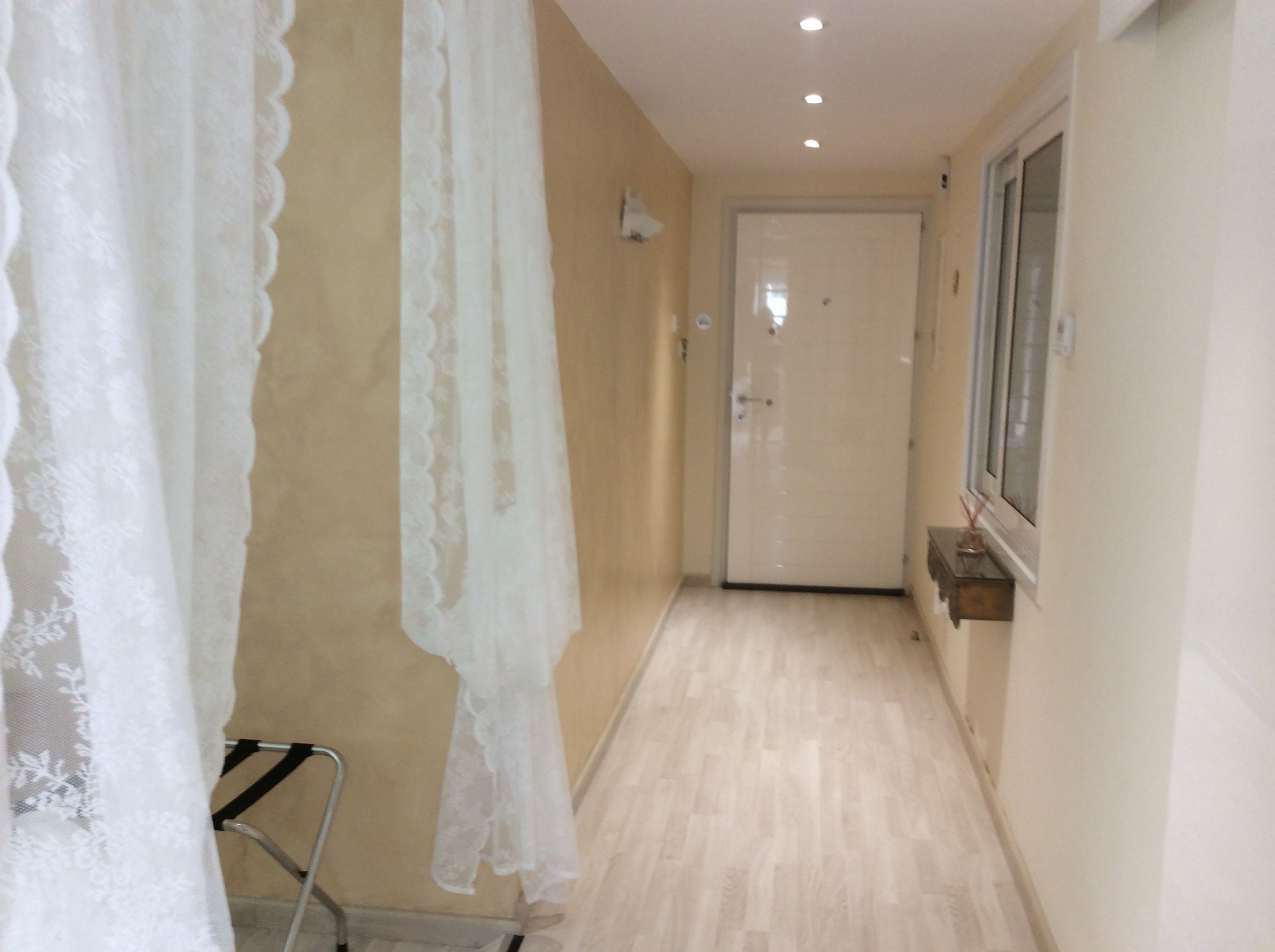 superior suite (fantasia) | in-room safe, desk, blackout curtains, iron/ironing board