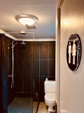 Shower, hair dryer, towels, soap