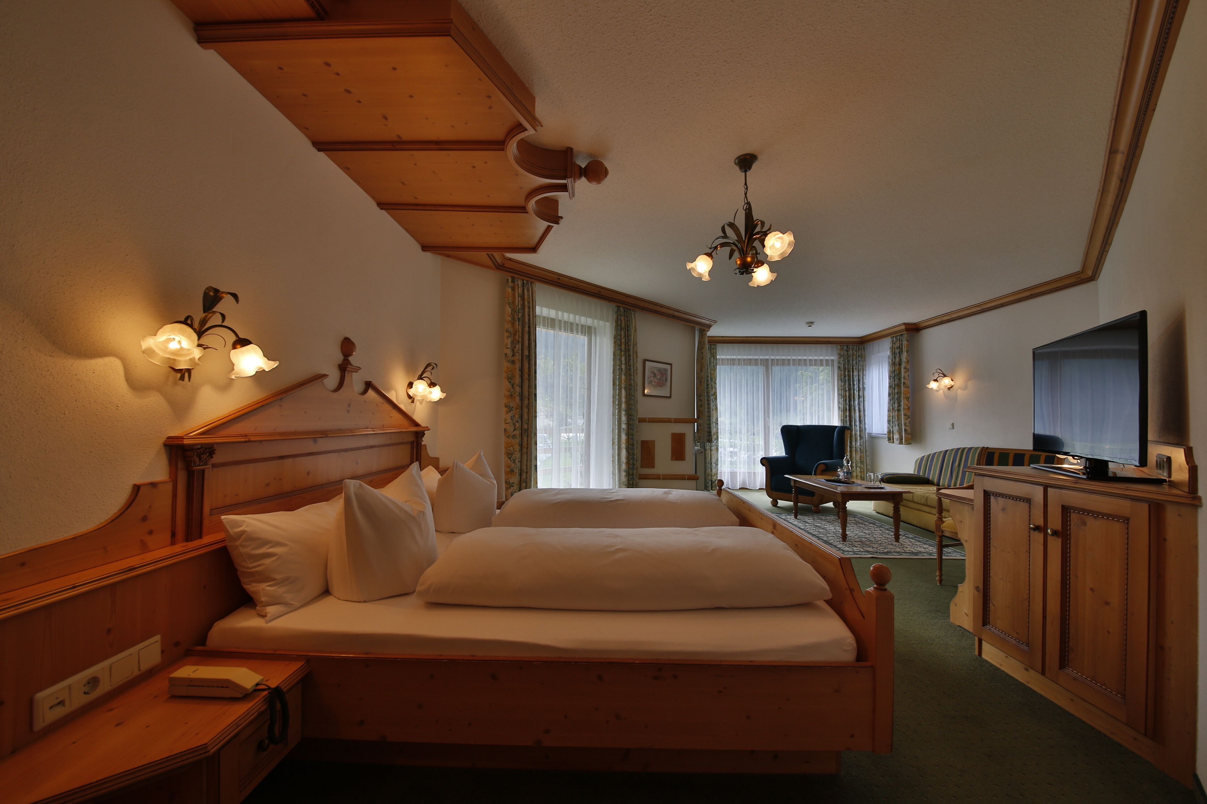 comfort double room, lake view | minibar, desk, laptop workspace, cots/infant beds