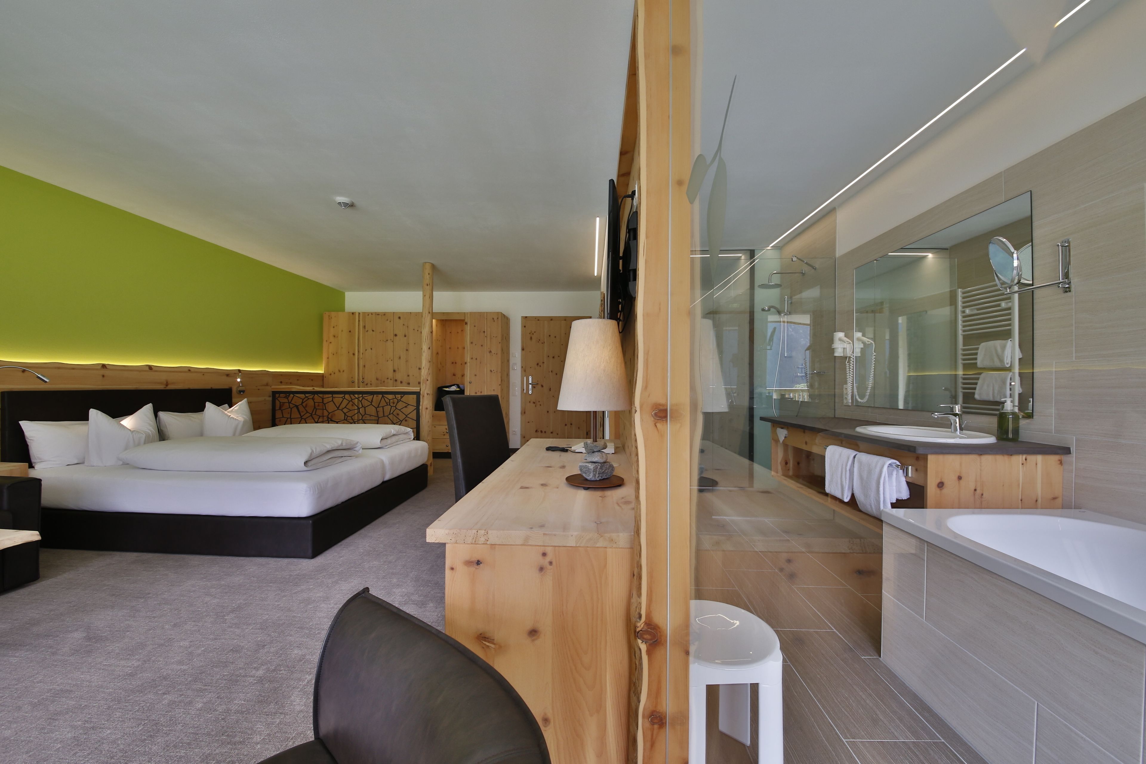 junior suite, lake view | minibar, desk, laptop workspace, cots/infant beds