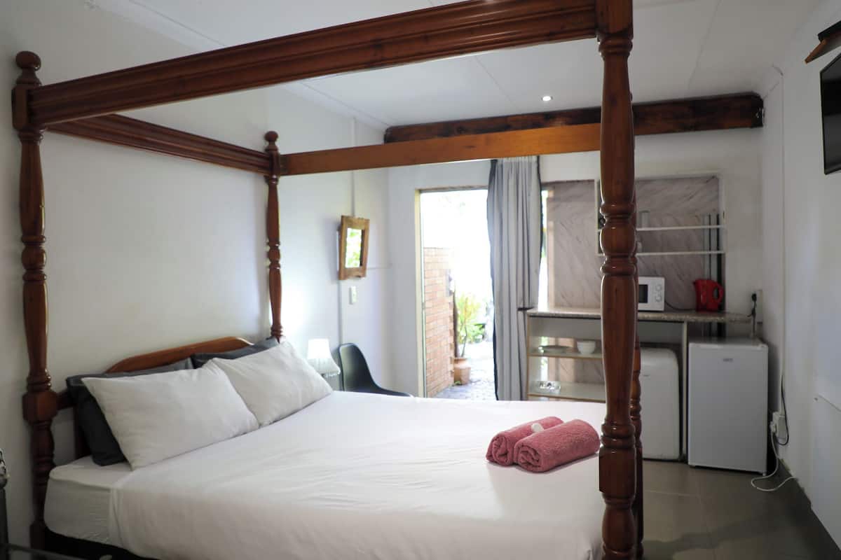 Suite Luxe, 1 grand lit | Coin séjour | Télévision à écran plat