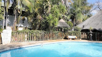 Outdoor pool, pool umbrellas, pool loungers