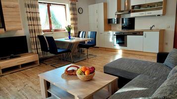Apartment, 1 Bedroom (3 Edelweiss) | Living area | Flat-screen TV, DVD player, ping pong