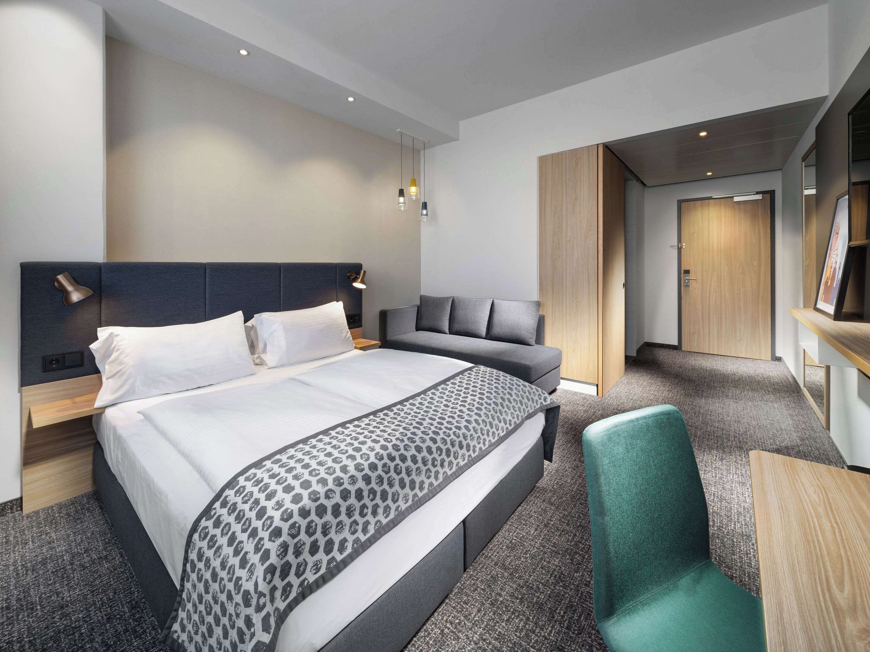 executive room with sofa | premium bedding, desk, laptop workspace, blackout curtains