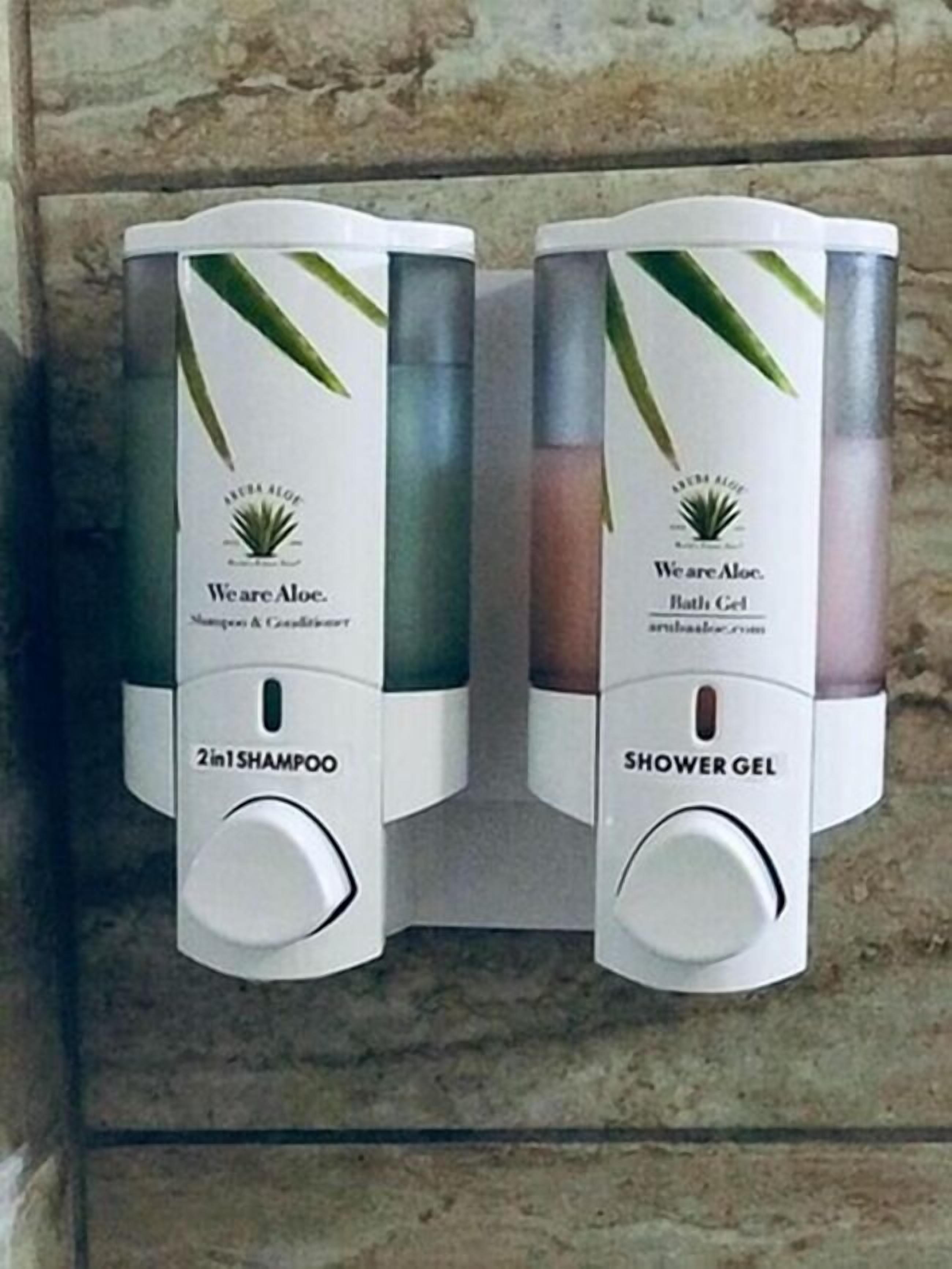 deluxe triple room with kitchen | bathroom | shower, hair dryer, towels, soap