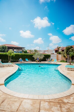 Outdoor pool, open 8:00 AM to 10:00 PM, pool umbrellas, sun loungers