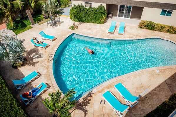 Outdoor pool, open 8:00 AM to 10:00 PM, pool umbrellas, sun loungers