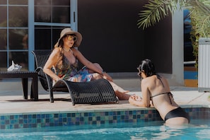 Outdoor pool, open 8:00 AM to 9:00 PM, pool umbrellas, pool loungers