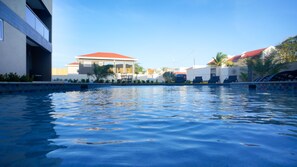 Outdoor pool, open 8:00 AM to 10:00 PM, pool umbrellas, sun loungers