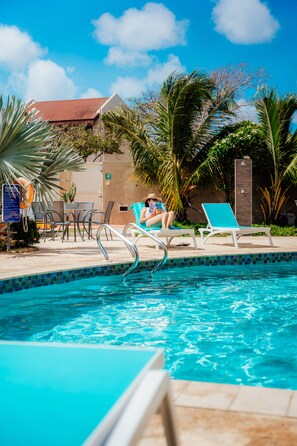 Outdoor pool, open 8:00 AM to 10:00 PM, pool umbrellas, sun loungers