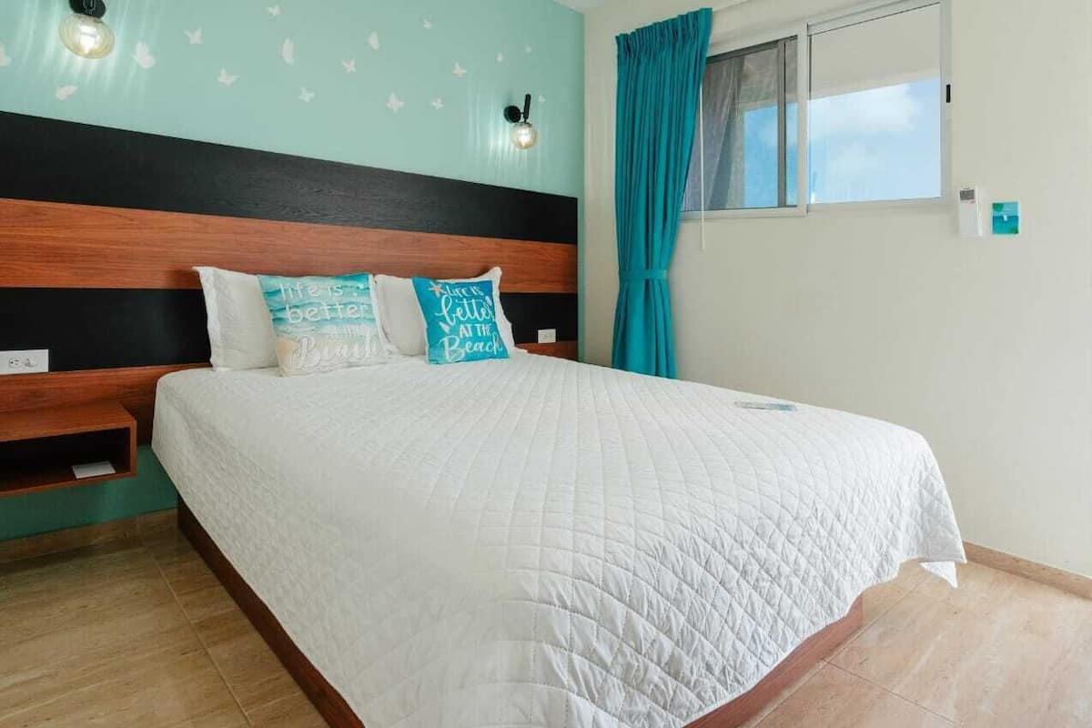 Junior Suite, 1 Queen Bed, Non Smoking, Balcony | Down comforters, in-room safe, laptop workspace, blackout drapes