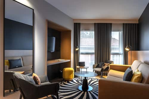 Suite | Living room | 20-inch LCD TV with satellite channels, TV