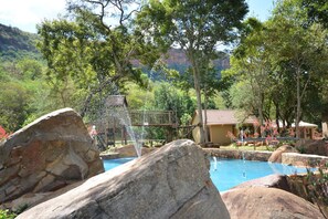 Outdoor pool, open 8:00 AM to 6:00 PM, pool umbrellas, sun loungers