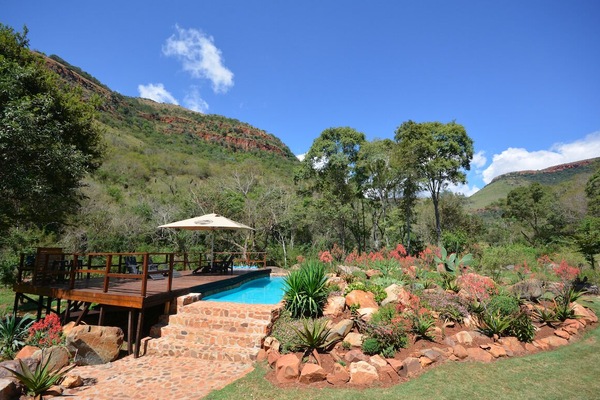 Outdoor pool, open 8:00 AM to 6:00 PM, pool umbrellas, sun loungers