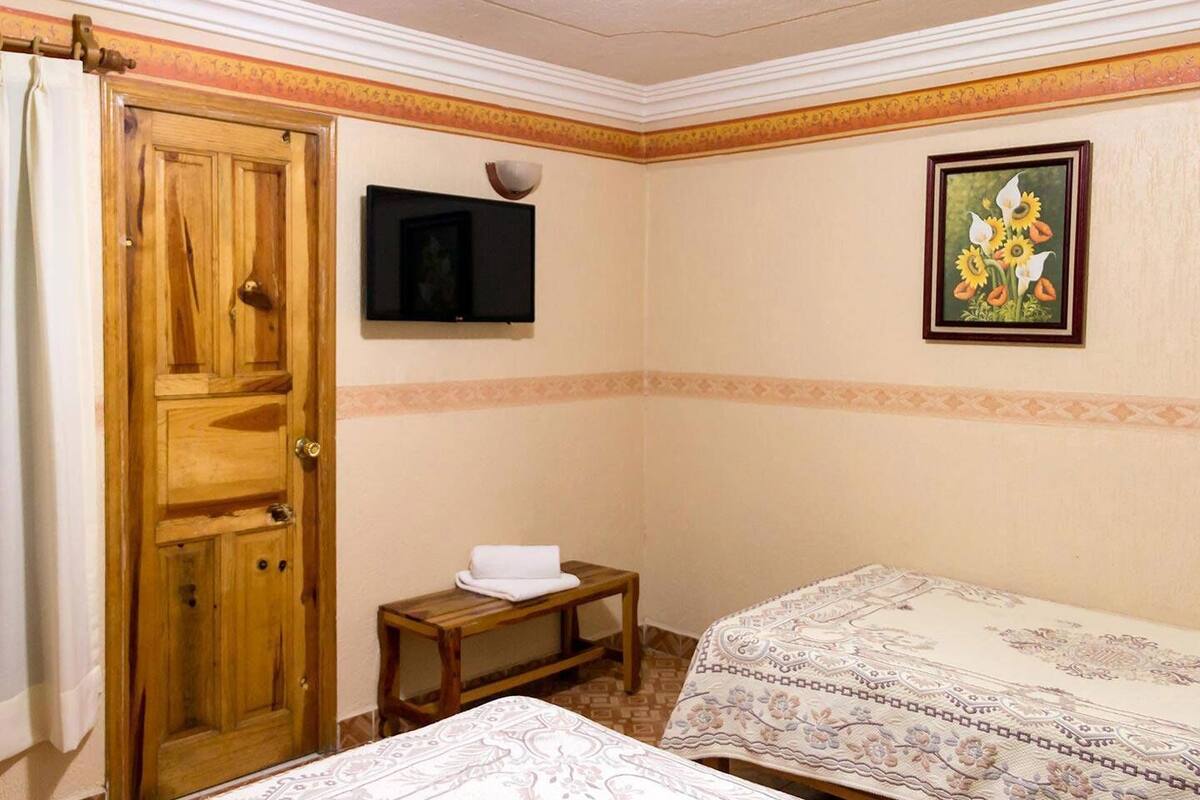 Desk, blackout curtains, iron/ironing board (on request), free WiFi