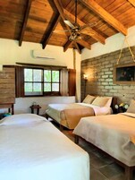 Deluxe Triple Room, Multiple Beds, Garden View | Desk, bed sheets