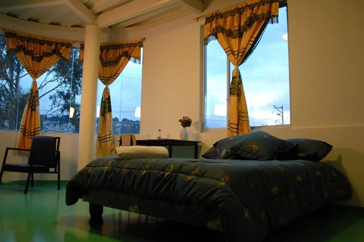 Premium bedding, down comforters, desk, laptop workspace