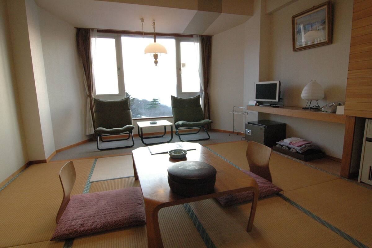 Japanese Style Room for 4 Guests, Window side | Living area | Flat-screen TV