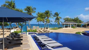 Outdoor pool, open 7:00 AM to 6:00 PM, pool umbrellas, sun loungers