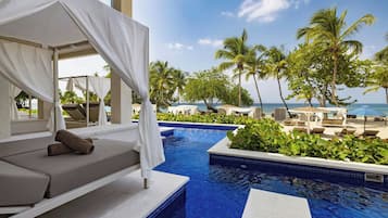Luxury Junior Suite Ocean Front Swim Out Diamond Club | 1 quarto, roupas de cama premium