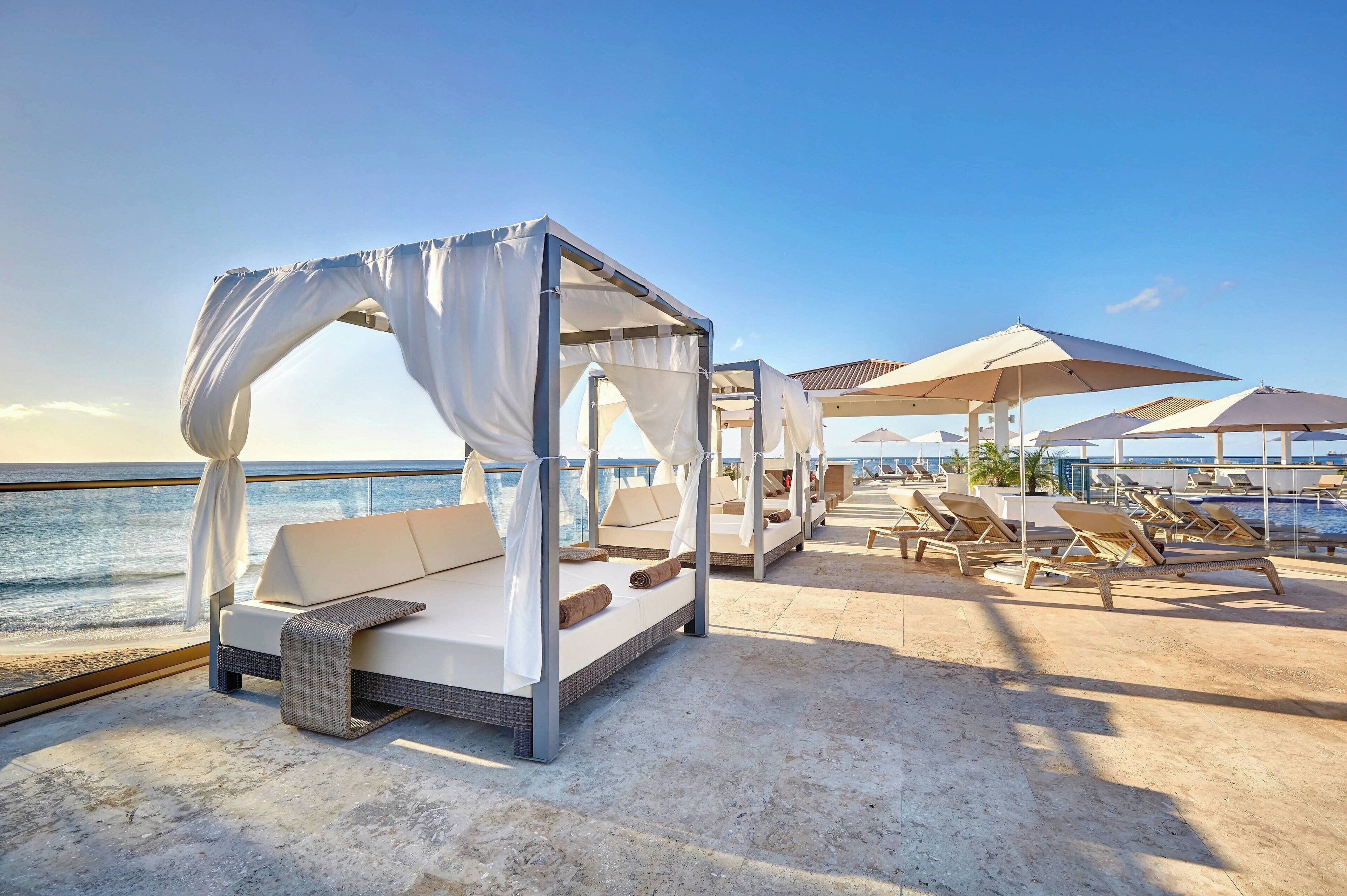 Outdoor pool, open 7:00 AM to 6:00 PM, pool umbrellas, pool loungers