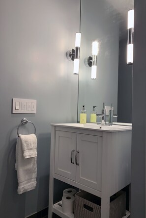 Hair dryer, towels, soap, toilet paper