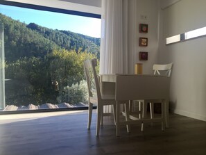 Comfort Suite, Balcony | Living area | Flat-screen TV, fireplace