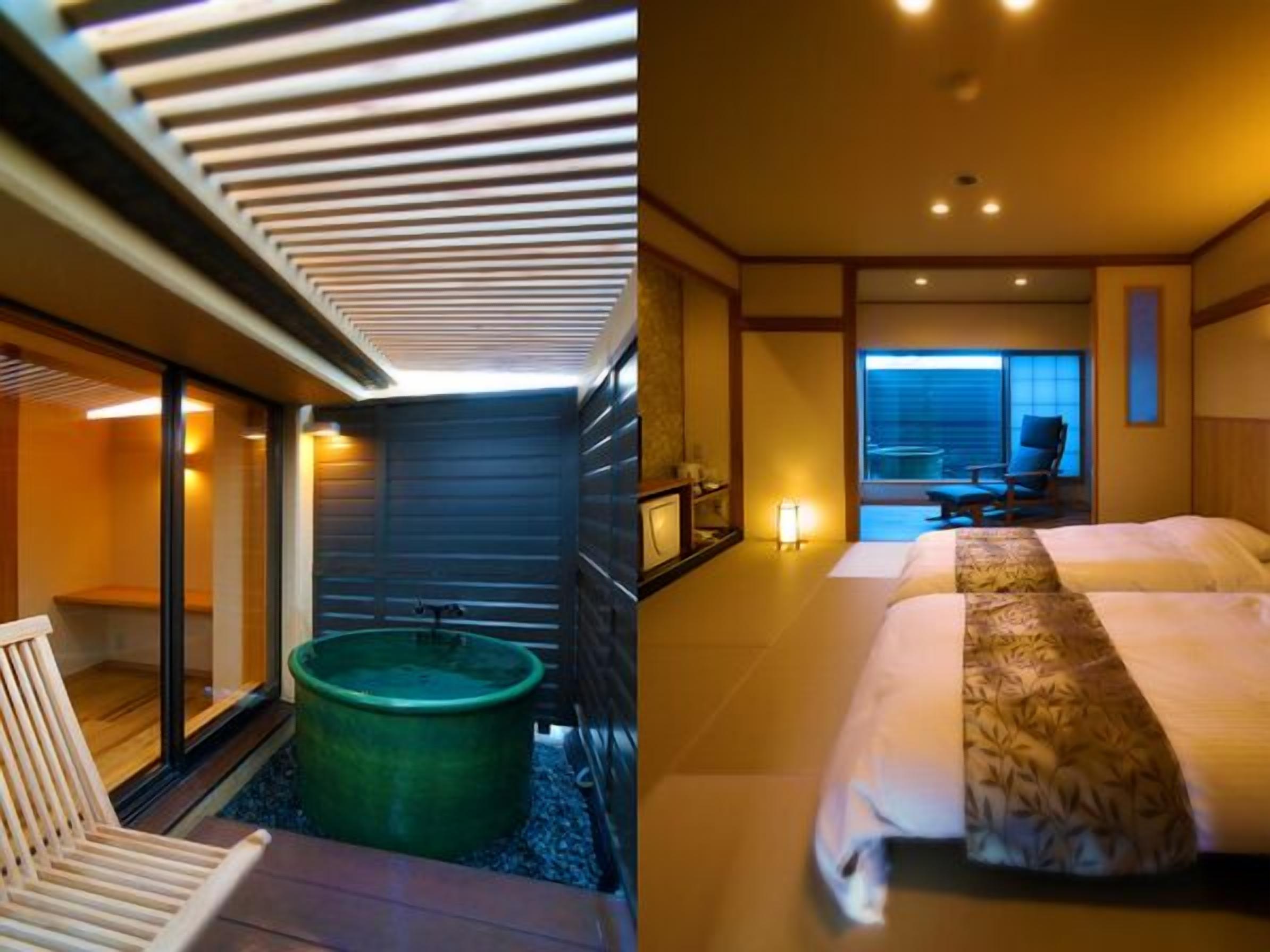 A modern hotel room with a large bed, a sitting area with a chair, a large window, and a green tub.