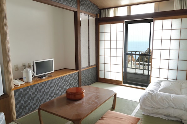 Chambre avec lits jumeaux | AccĂšs au Wi-Fi (inclus)