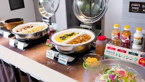A buffet counter with various dishes and condiments. - Super Hotel Yokkaichi Ekimae (Yokkaichi)