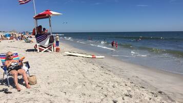On the beach, sun loungers, beach towels