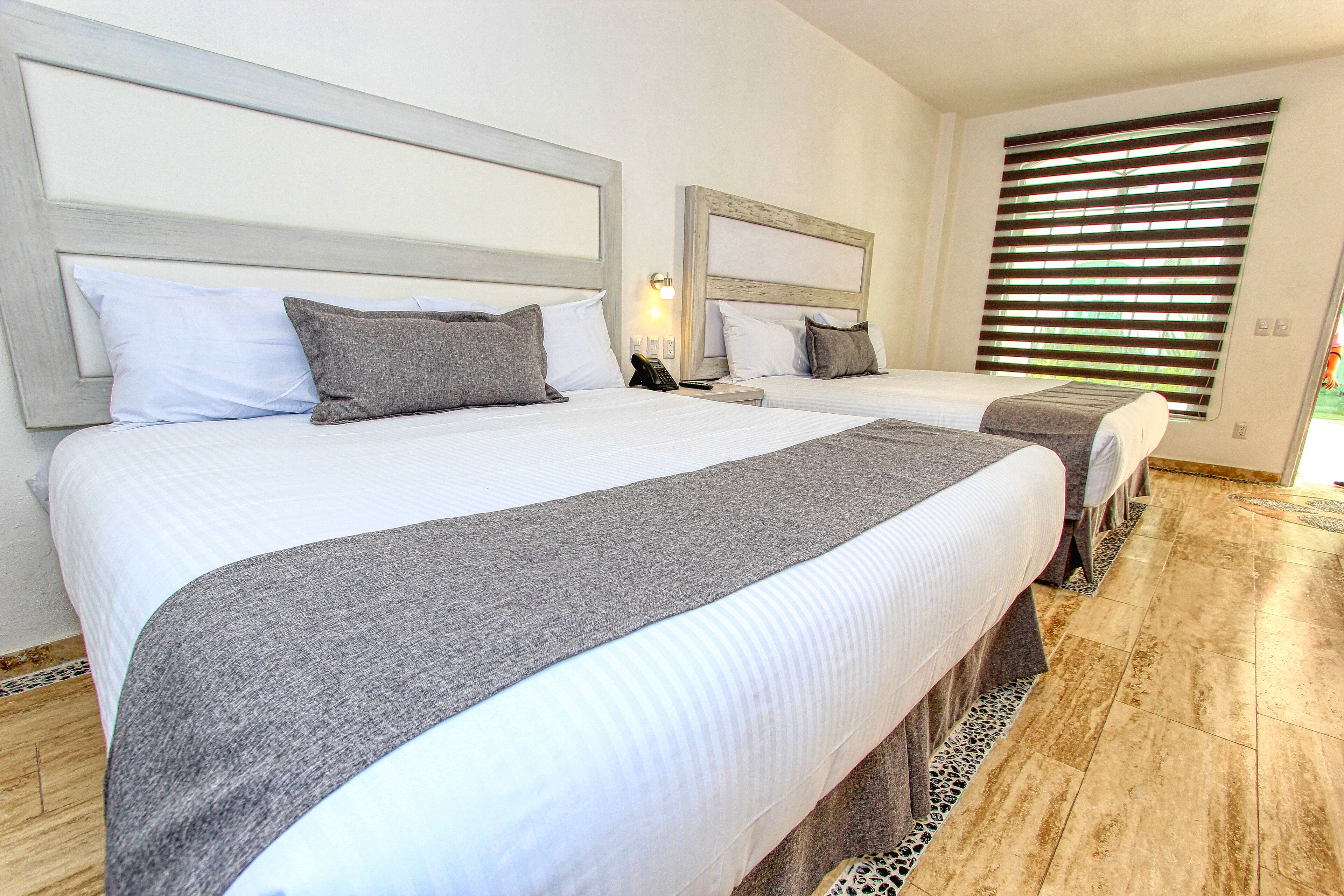 standard room, multiple beds | minibar, desk, blackout curtains, iron/ironing board