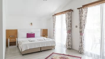 Ropa de cama de alta calidad, cubrecamas y minibar