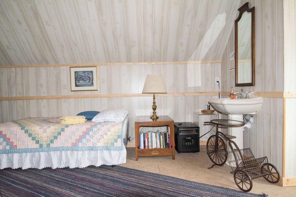 1st Dorm room upstairs with 5 beds and a half-bath.