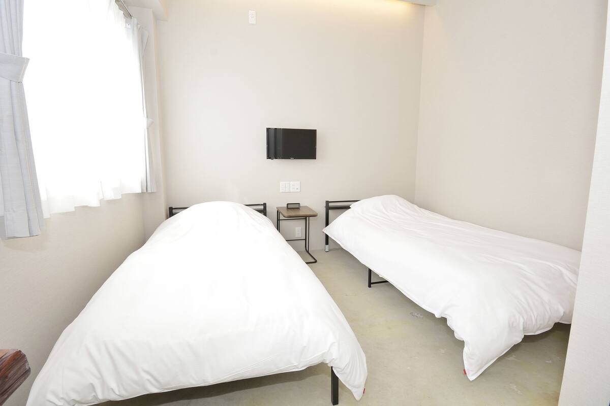 基础双床房 | 2 多间卧室、办公桌、笔记本电脑工作区、遮光窗帘