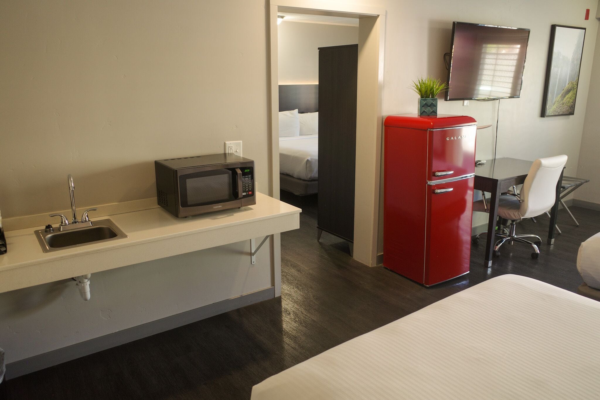 king queen queen ada suite | 1 bedroom, individually decorated, desk, laptop workspace