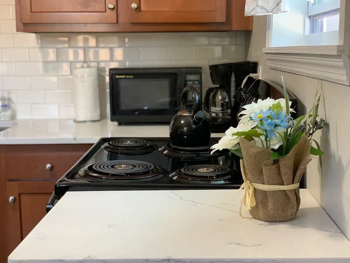 Fridge, microwave, coffee/tea maker, dining tables