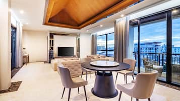 Family Villa with Private Pool | Living room | 55-inch flat-screen TV with cable channels, TV