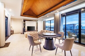 Family Villa with Private Pool | Living room | 55-inch flat-screen TV with cable channels, TV