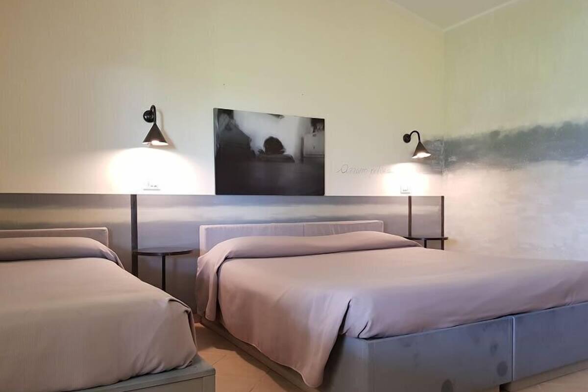 Triple Room | Free cots/infant beds, rollaway beds, free WiFi, bed sheets