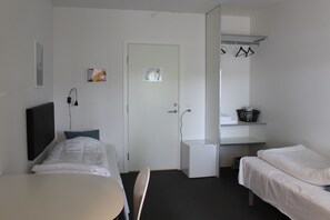 Economy Double Room | Living room | TV