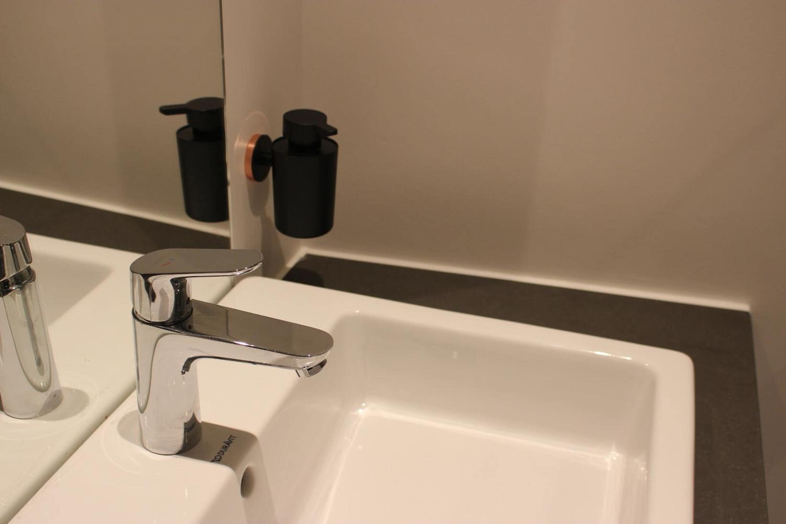 shower, hydromassage showerhead, hair dryer, towels