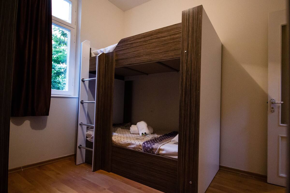 Premium bedding, blackout curtains, soundproofing, iron/ironing board