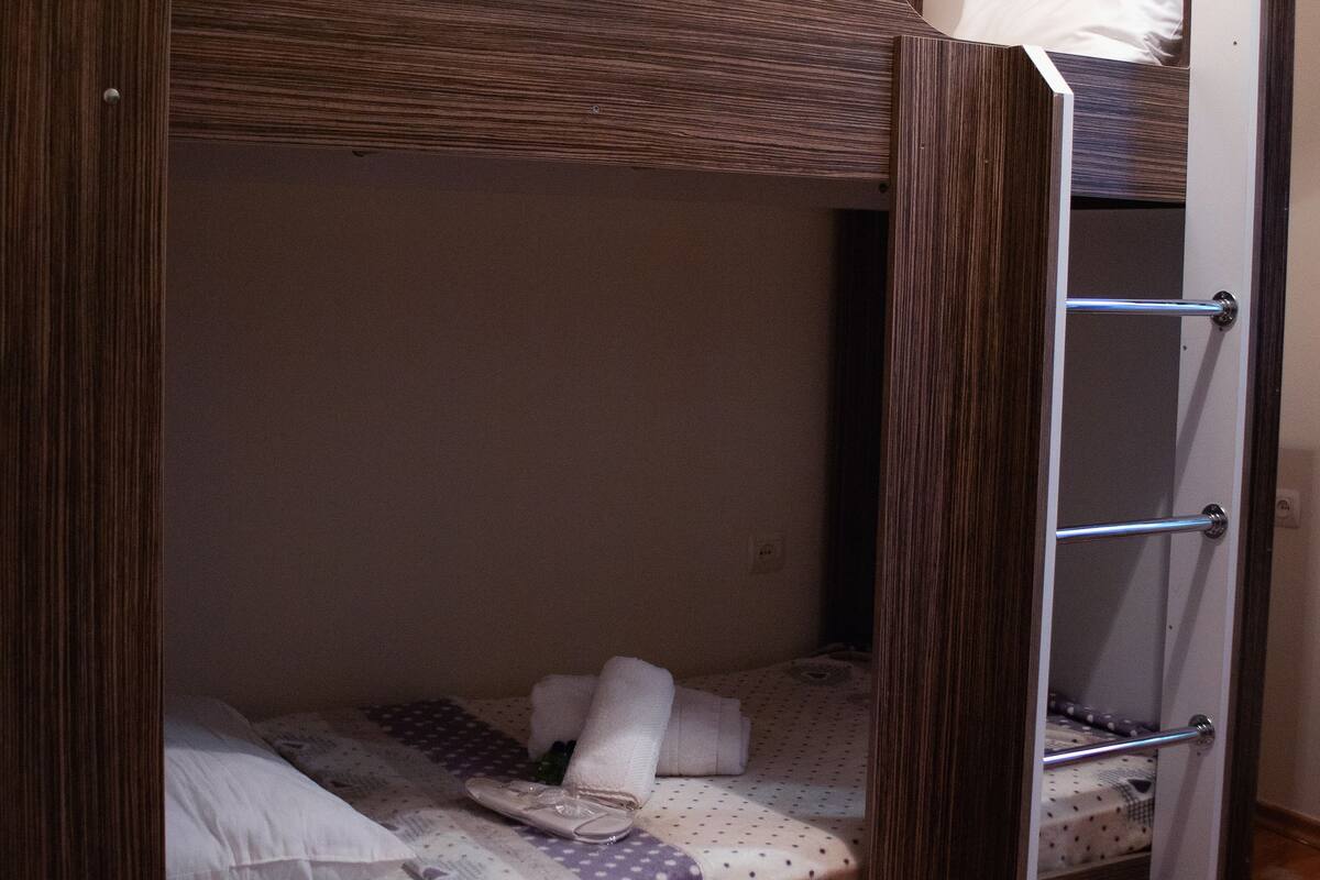 Premium bedding, blackout curtains, soundproofing, iron/ironing board