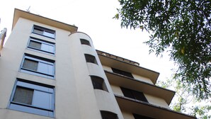 A multi-story building with a beige facade, multiple windows, and balconies. - Hotel Park View Mumbai (Mumbai)